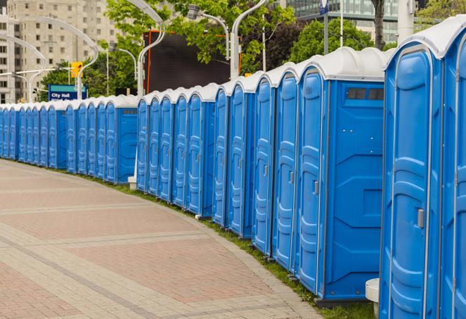 hygienic portable restrooms lined up at a beach party, ensuring guests have access to the necessary facilities while enjoying the sun and sand in Newcastle, CA